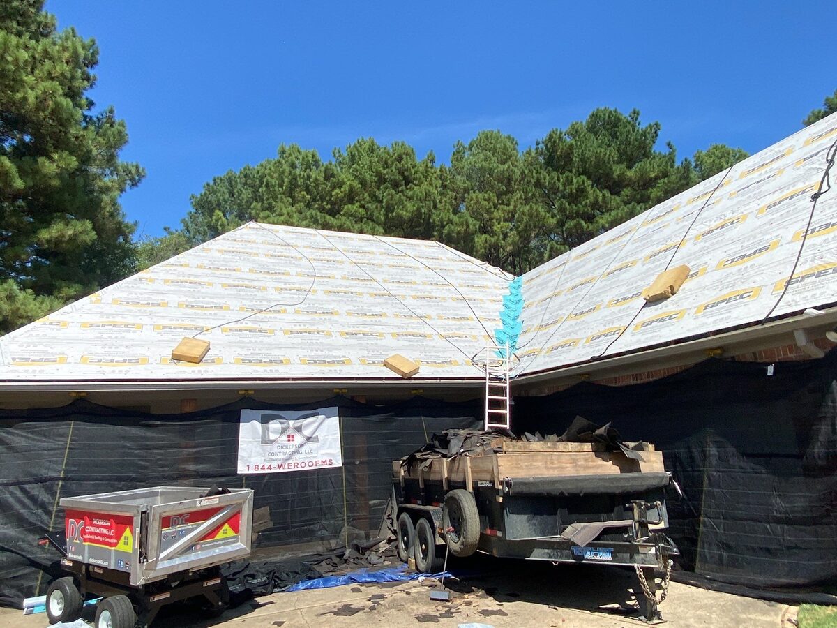 Roof dried in and the walls tarped on a Dickerson storm job