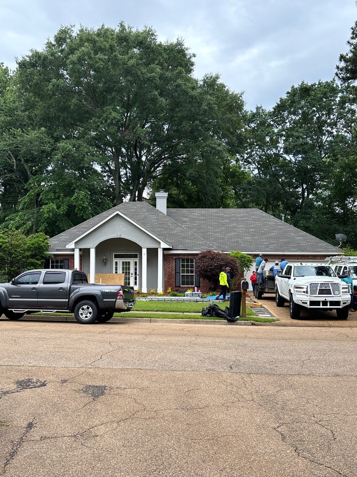 Dickerson crew and trucks on site for a roof claim