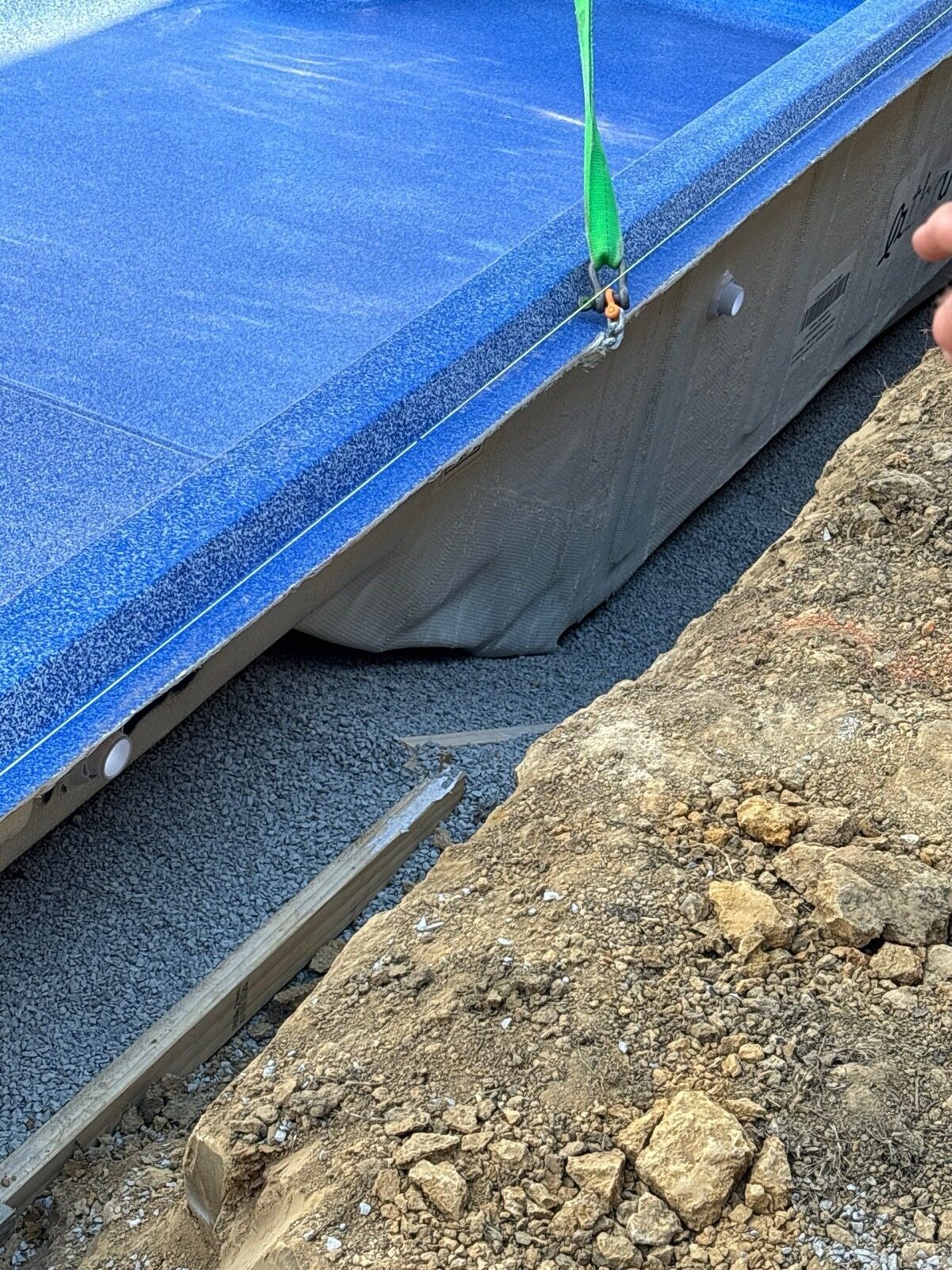 Crane setting the Latham fiberglass shell