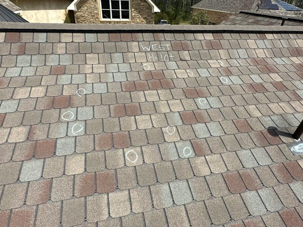 Roof marked up for damage during an inspection, roof repair by Dickerson Contracting in Brandon, MS