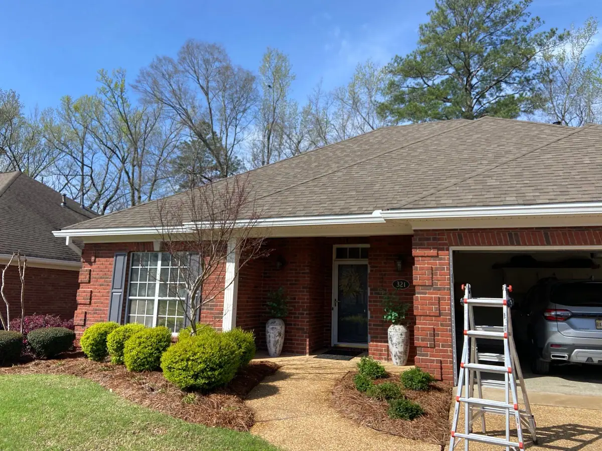 Completed shingle roof on a house in Brandon, MS, by roofing company Dickerson Contracting