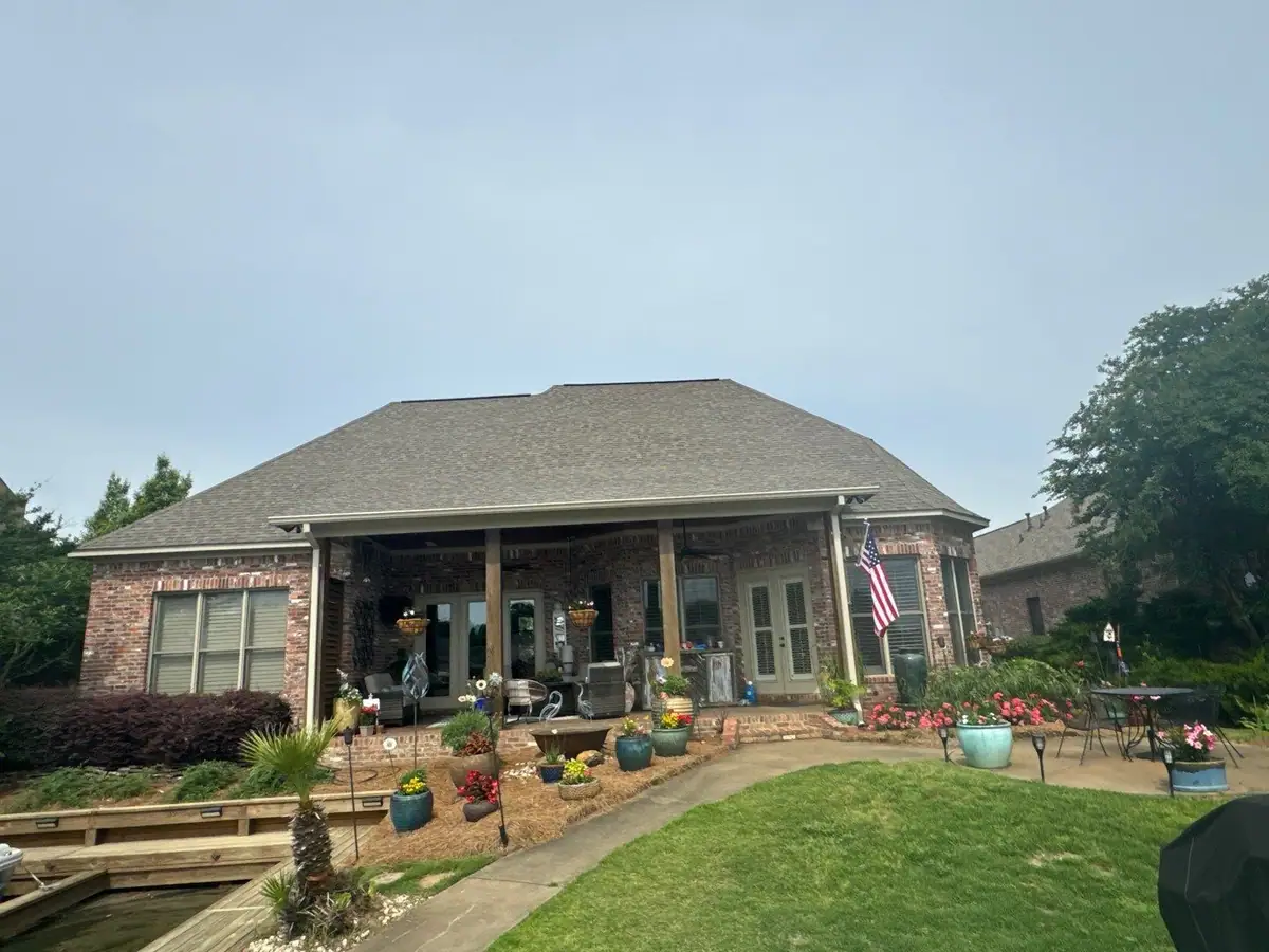 Completed shingle roof on a house in Madison, MS, by roofing company Dickerson Contracting