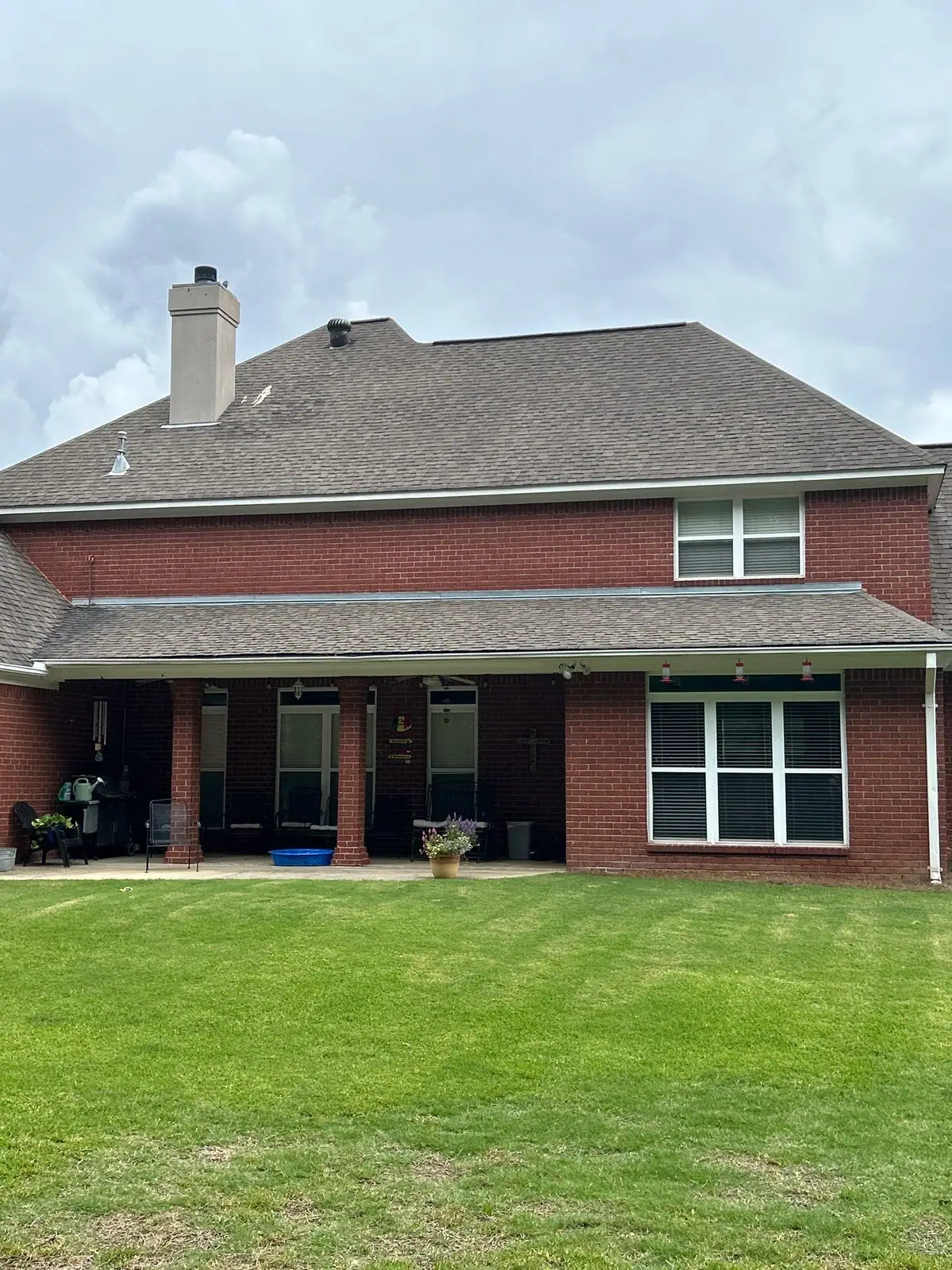 Completed shingle roof on a house, residential roofing by Dickerson Contracting in Madison, MS