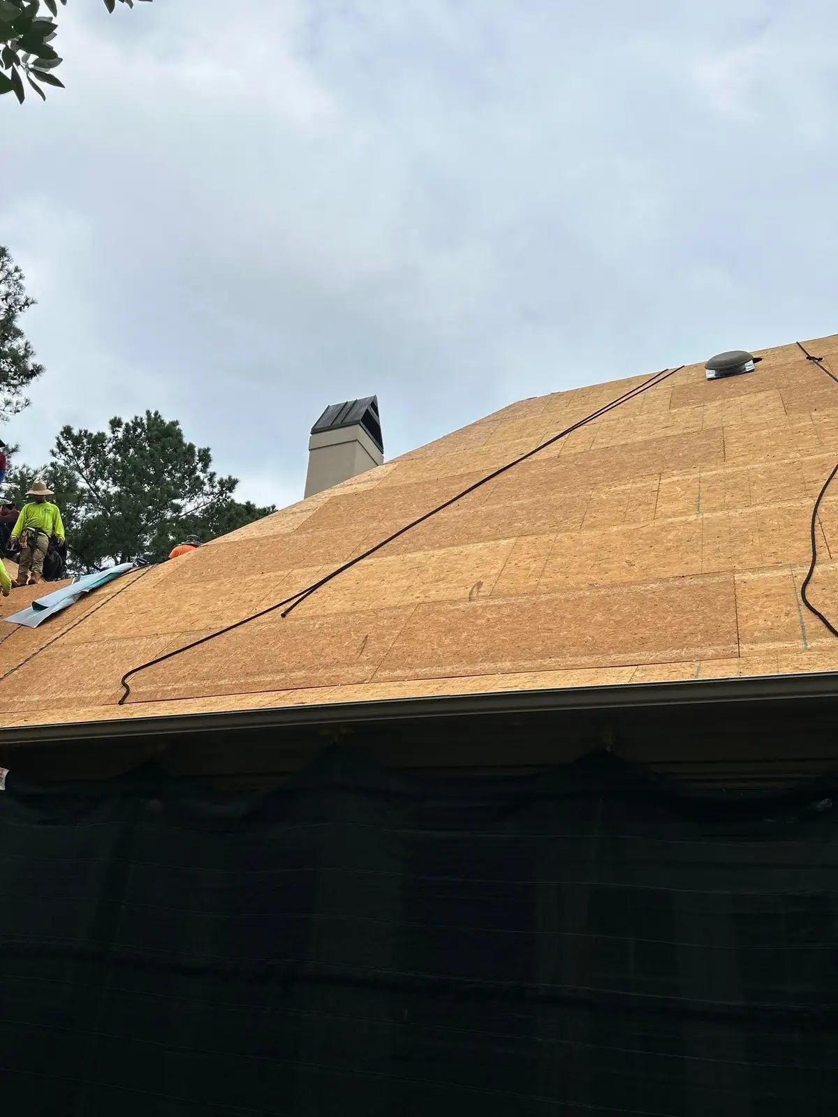 Roof decking exposed and being replaced, residential roofing by Dickerson Contracting in Ridgeland, MS