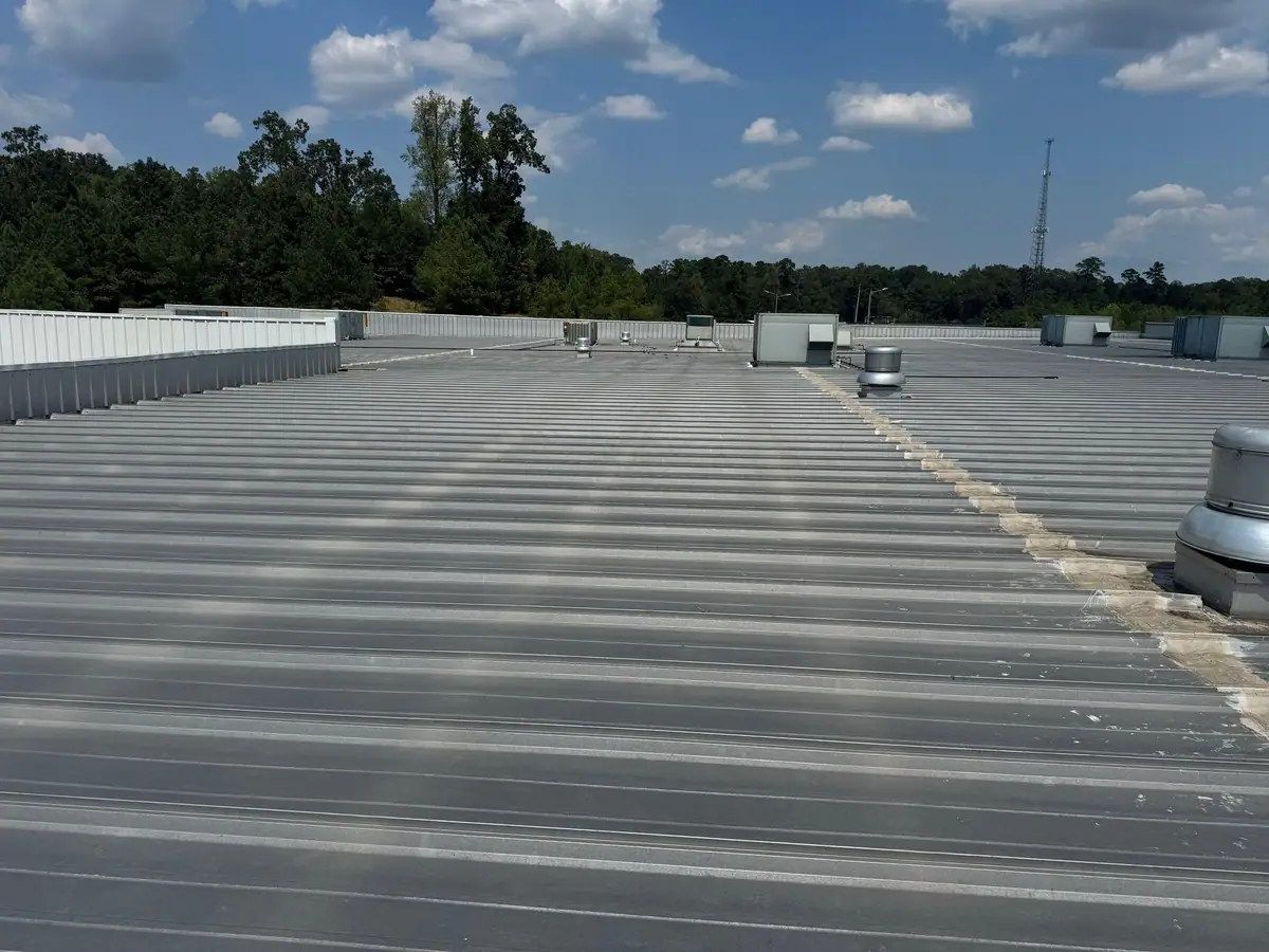Large standing seam metal roof on a commercial building, commercial roofing by Dickerson Contracting