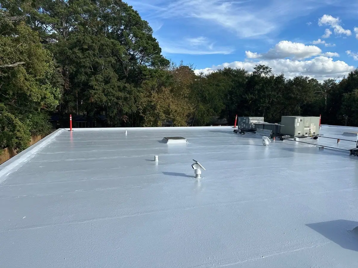 Finished white membrane on a commercial building, flat roof repair and replacement by Dickerson Contracting