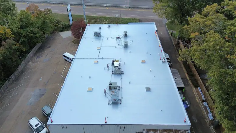Finished white TPO roof on a commercial building, commercial roofing