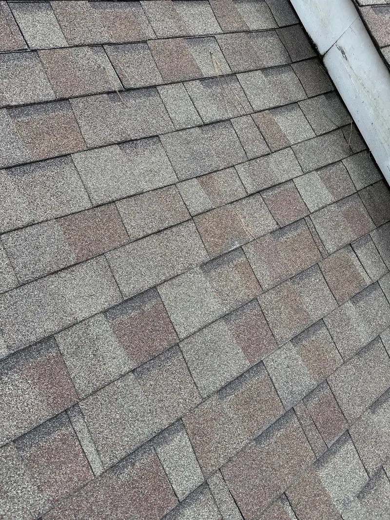 Completed shingle roof on a house, residential roofing by Dickerson Contracting in Jackson, MS