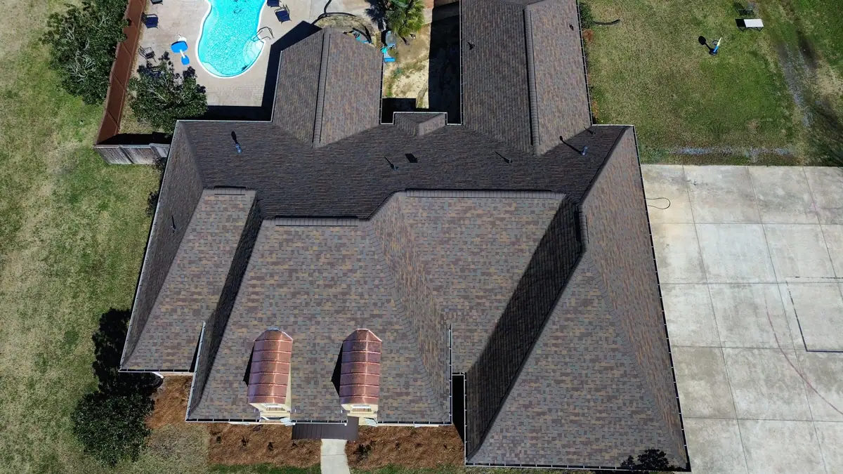 Aerial view of a finished shingle roof in Brandon, MS, by roofing company Dickerson Contracting