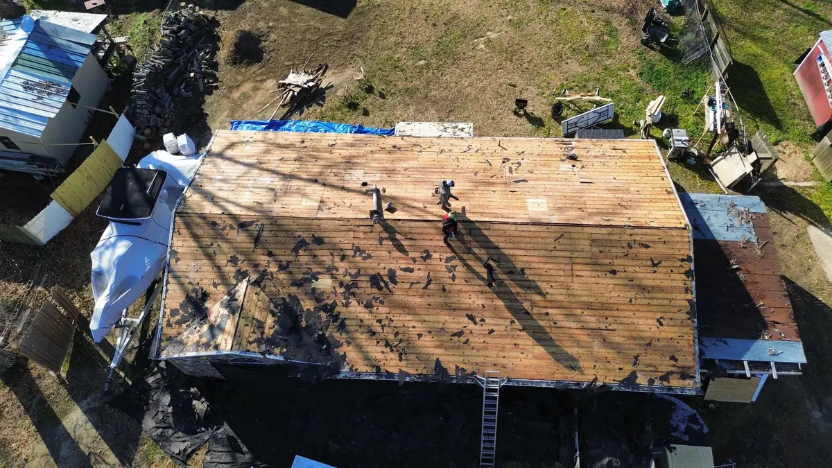 Roof decking exposed and being replaced, residential roofing by Dickerson Contracting in Pearl, MS