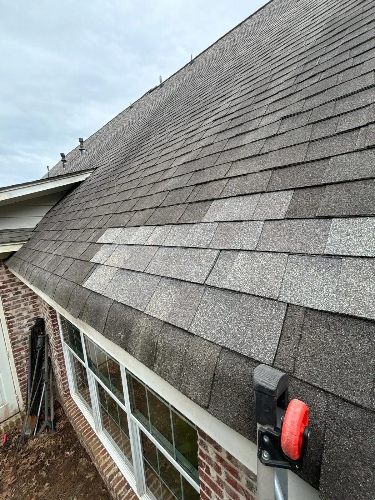 Finished shingle roof on a home in Clinton, MS, by roofing company Dickerson Contracting