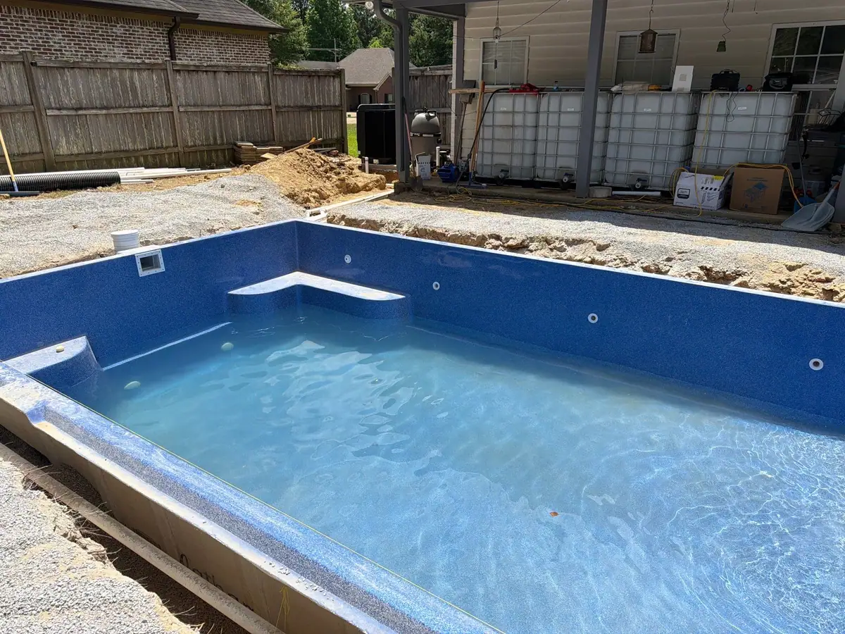 Finished pool and concrete deck, fiberglass pools by DC Pools and Spas serving Clinton, MS
