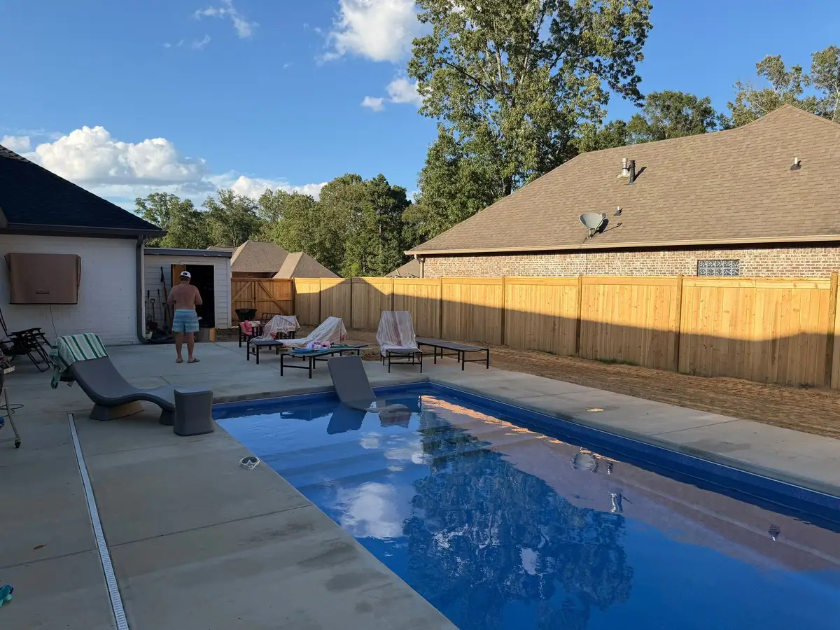 Finished pool and concrete deck, fiberglass pools by DC Pools and Spas serving Ridgeland, MS