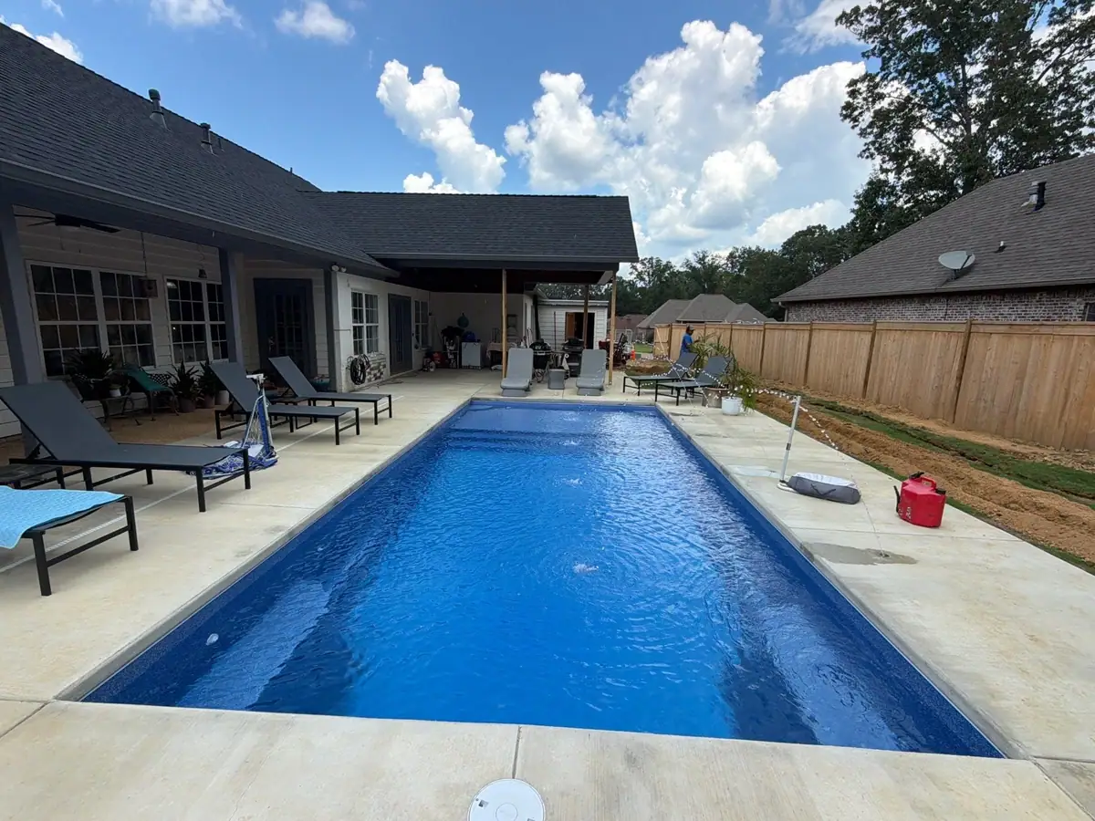 Finished pool and concrete deck, fiberglass pools by DC Pools and Spas serving Jackson, MS