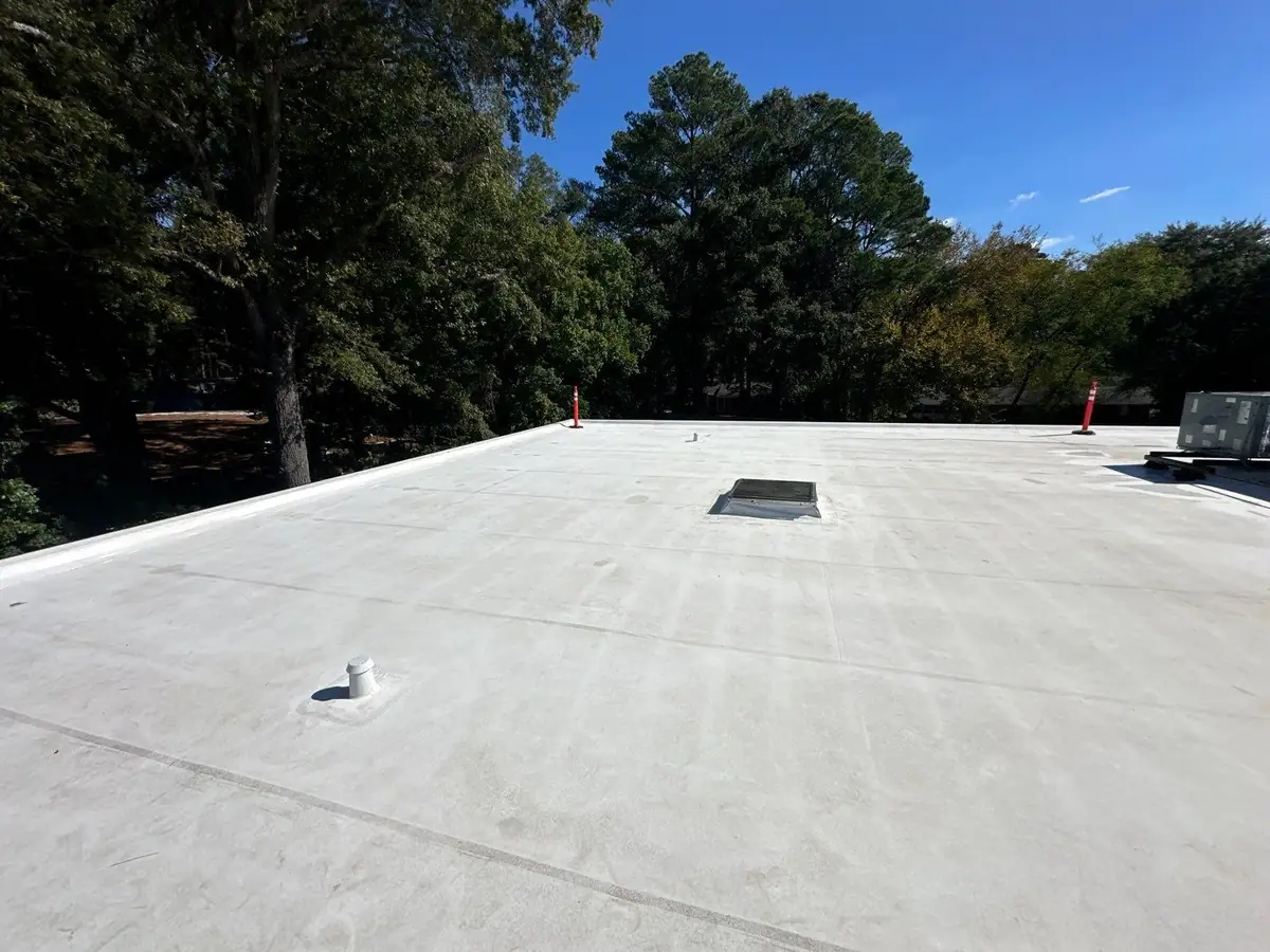 Finished white TPO membrane on a commercial flat roof, commercial roofing by Dickerson Contracting serving Brandon, MS