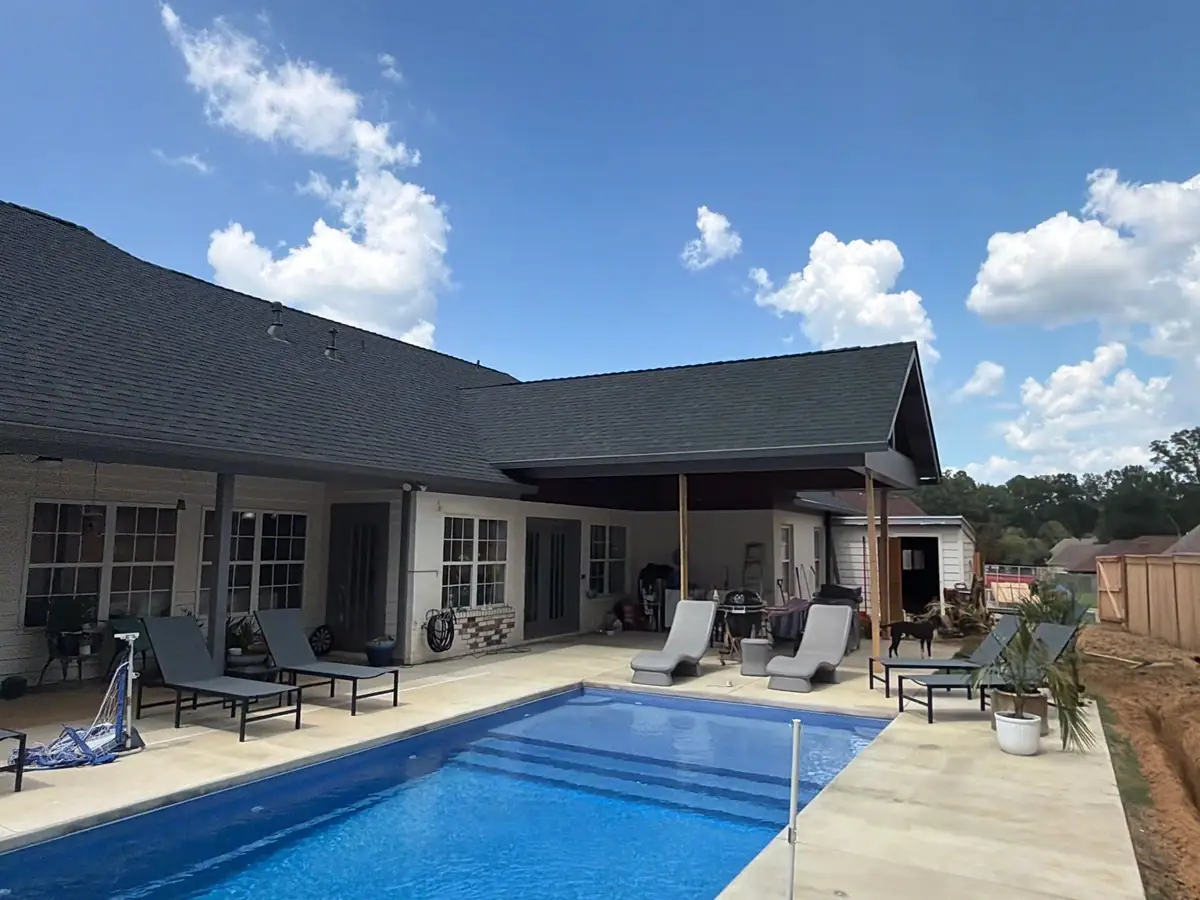 Fiberglass pool with molded entry steps and a bench ledge, Latham pools in Brandon, MS