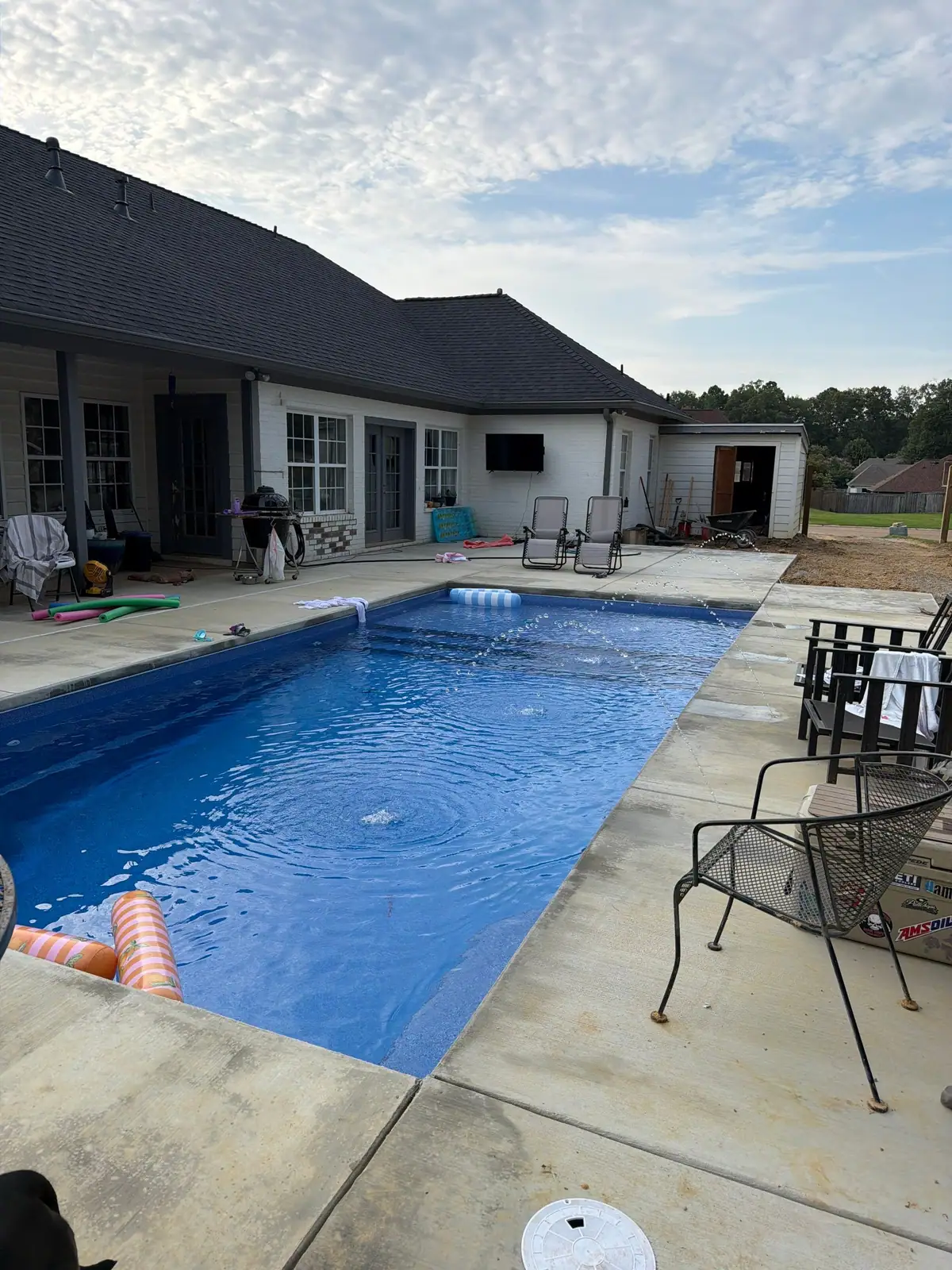 Inground fiberglass pool with a new concrete deck, inground pools serving Madison, MS