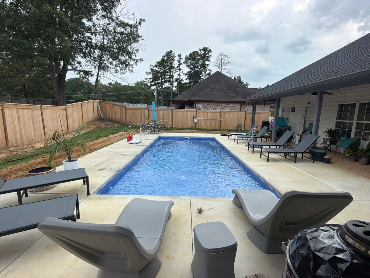 Finished Latham fiberglass pool seen from the far end, fiberglass pools serving Pearl, MS
