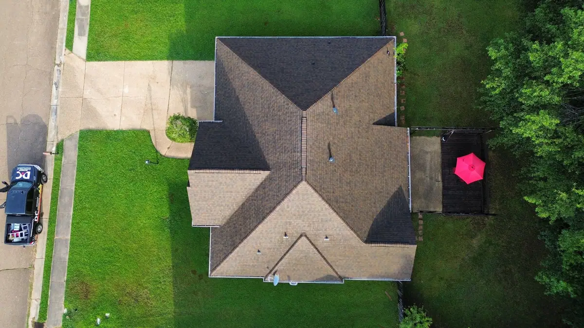 Overhead view of a finished shingle roof on a brick home, residential roofing by Dickerson Contracting serving Vicksburg, MS